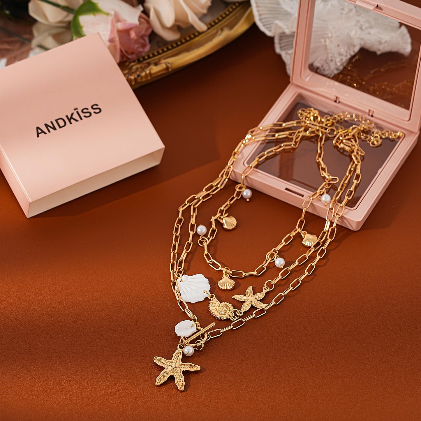 ANDKISS Shell Necklace Gold Layered Starfish Pendant Shell Choker Necklace for Women Pearl Beach Vacation Necklaces Summer Beach Jewelry