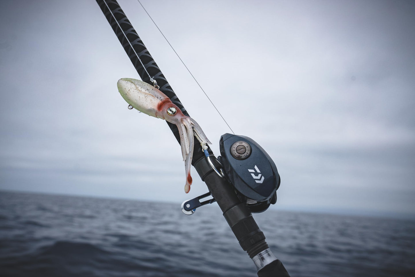 Nomad Design Squidtrex Patented Vibrating Fishing Lure- Scent Added TPE Soft Plastic Lure for Saltwater w/Strong BKK Assist Hooks, Fishing Bait that Catches Many Species, 95mm 3 3/4" 1oz- Aqua Ghost