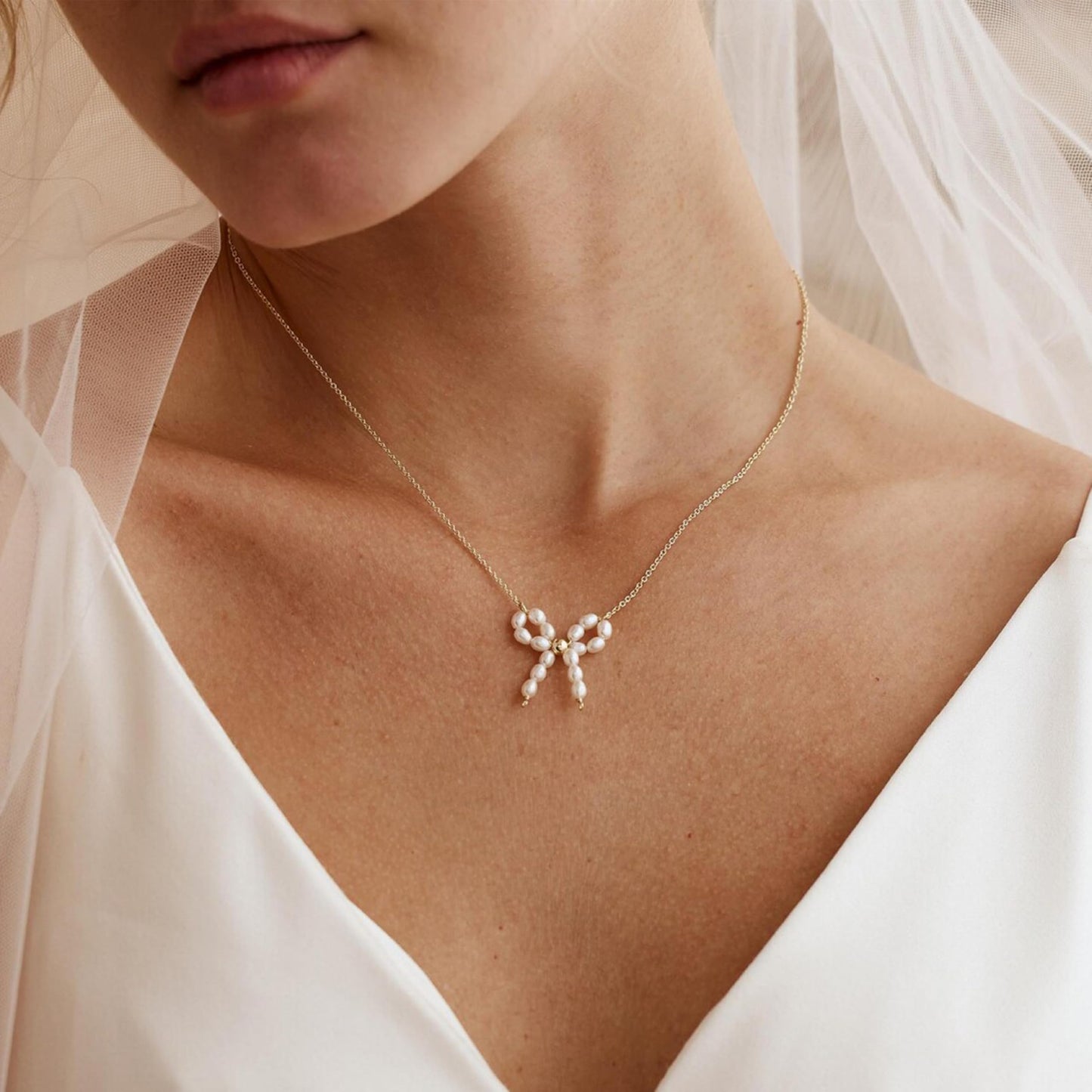 Caenyo Dainty Pearl Bow Pendant Necklace for Everyday Wear, 14K Gold Plated, Lightweight & Tarnish Resistant, Elegant Jewelry for Women